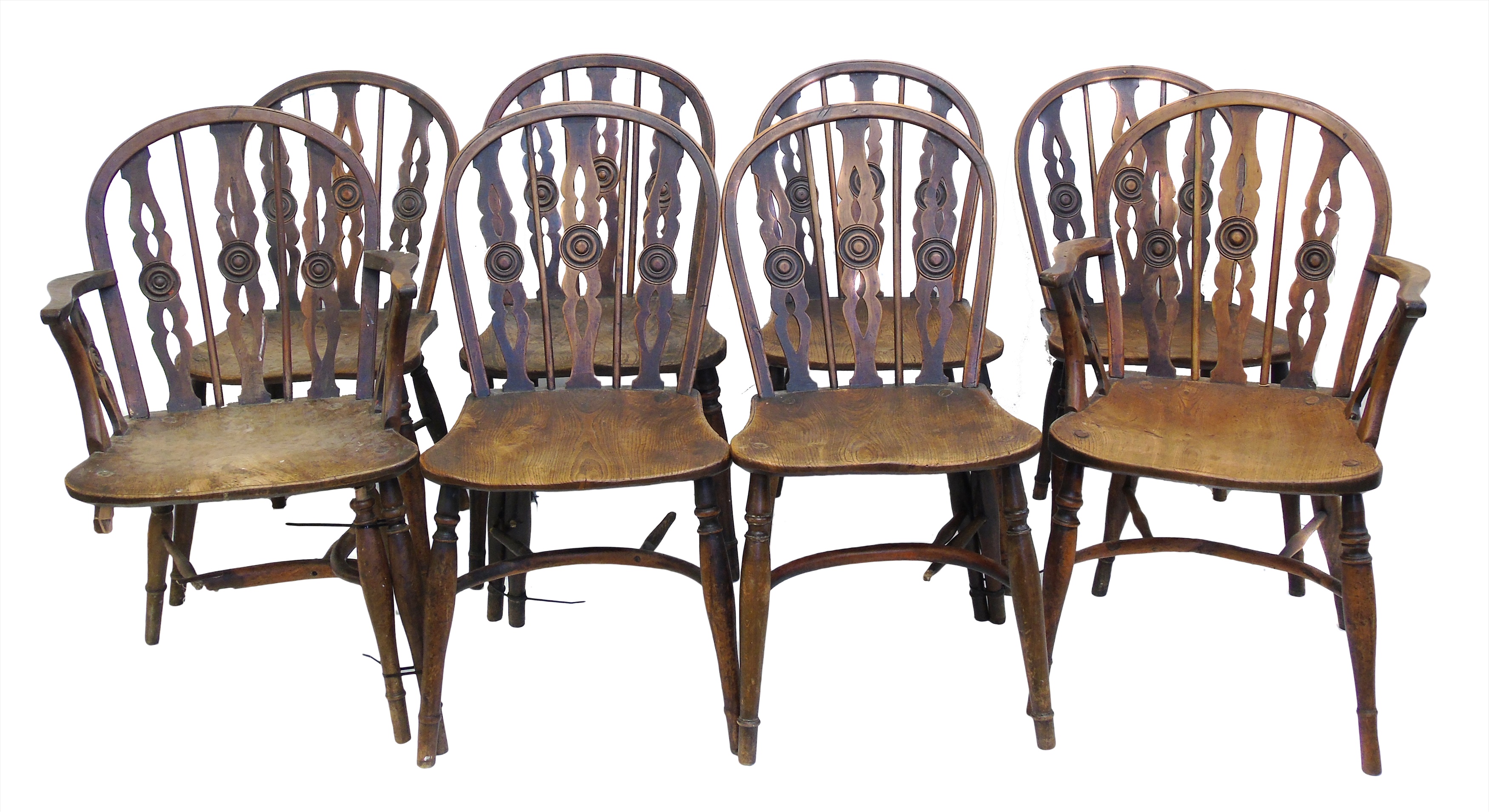 Eight 19th century Windsor chairs by Prior, comprising six single and two open arm carvers, each chair with typical three-splat back with bullseye turnings to centre of each, yew frame, ash saddle seat with scribed edge, crinoline stretchers.