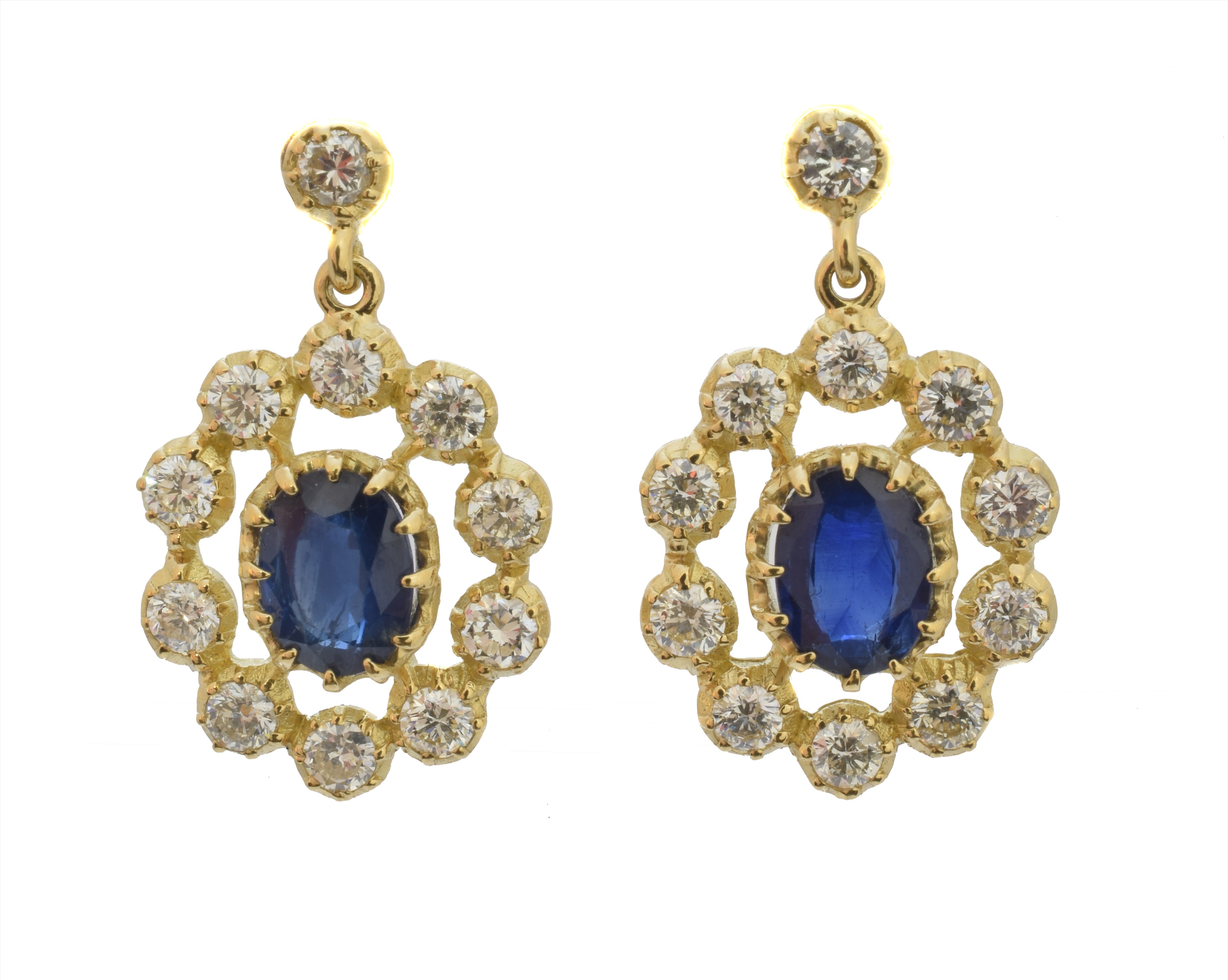 A pair of sapphire and diamond earrings, each designed as an oval shape sapphire within a brilliant cut diamond openwork surround, suspended from a similarly cut diamond surmount, stamped 750, estimated total diamond weight 1.35cts, length 2.3cm, gross weight 5.6g.