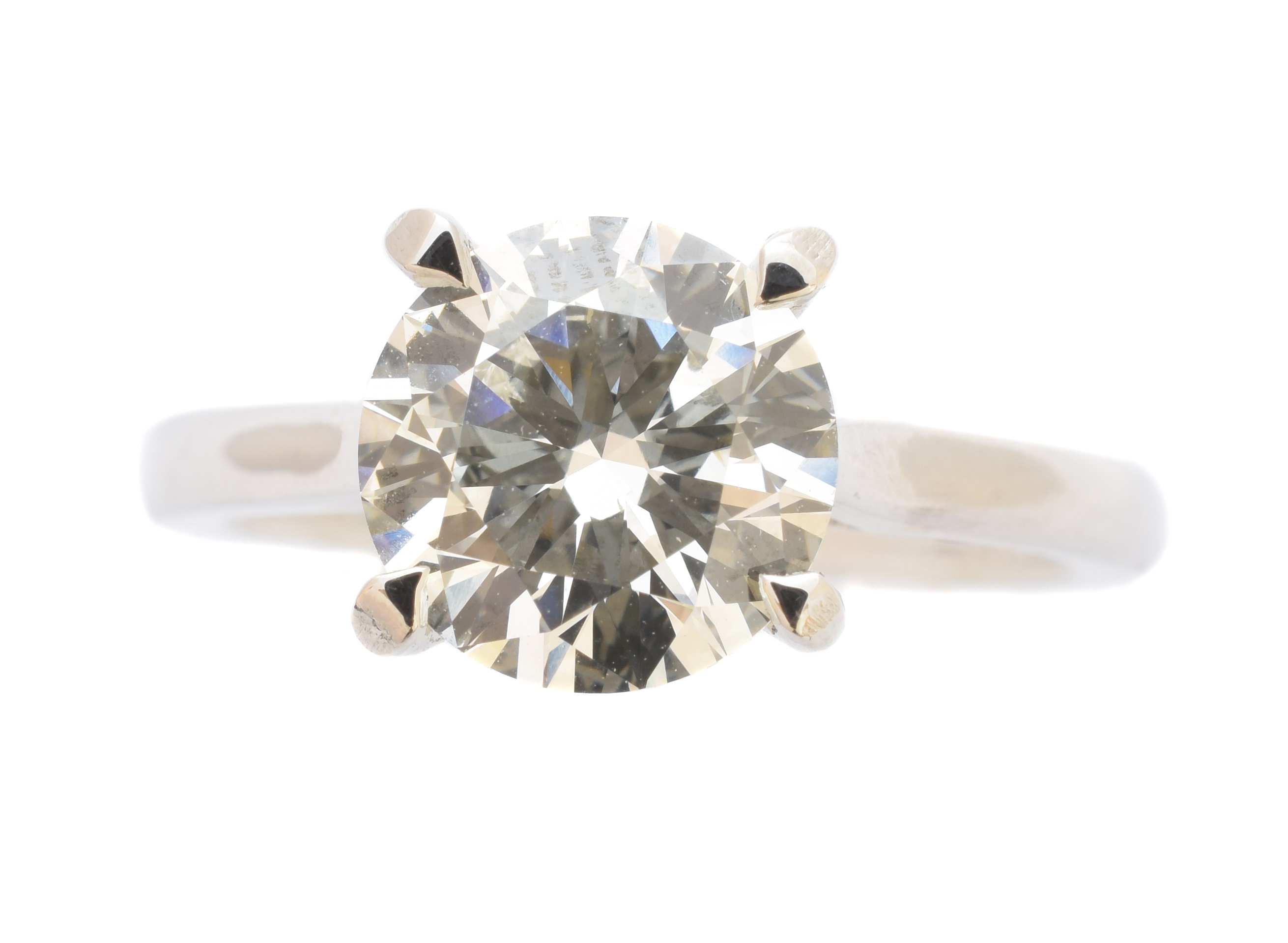 A platinum diamond single stone ring, the brilliant cut diamond within a four claw setting, estimated diamond weight 2.30cts, estimated colour I-J, estimated clarity SI, hallmarks for London, ring size M, gross weight 5.5g.