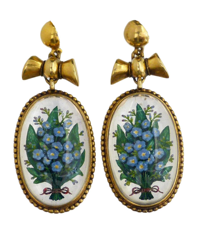 A pair of late Victorian Essex Crystal earrings, each designed as an oval reverse carved intaglio depicting forget-me-nots with red ribbon accent, within a beaded border and bow surmount, length 3.5cm.