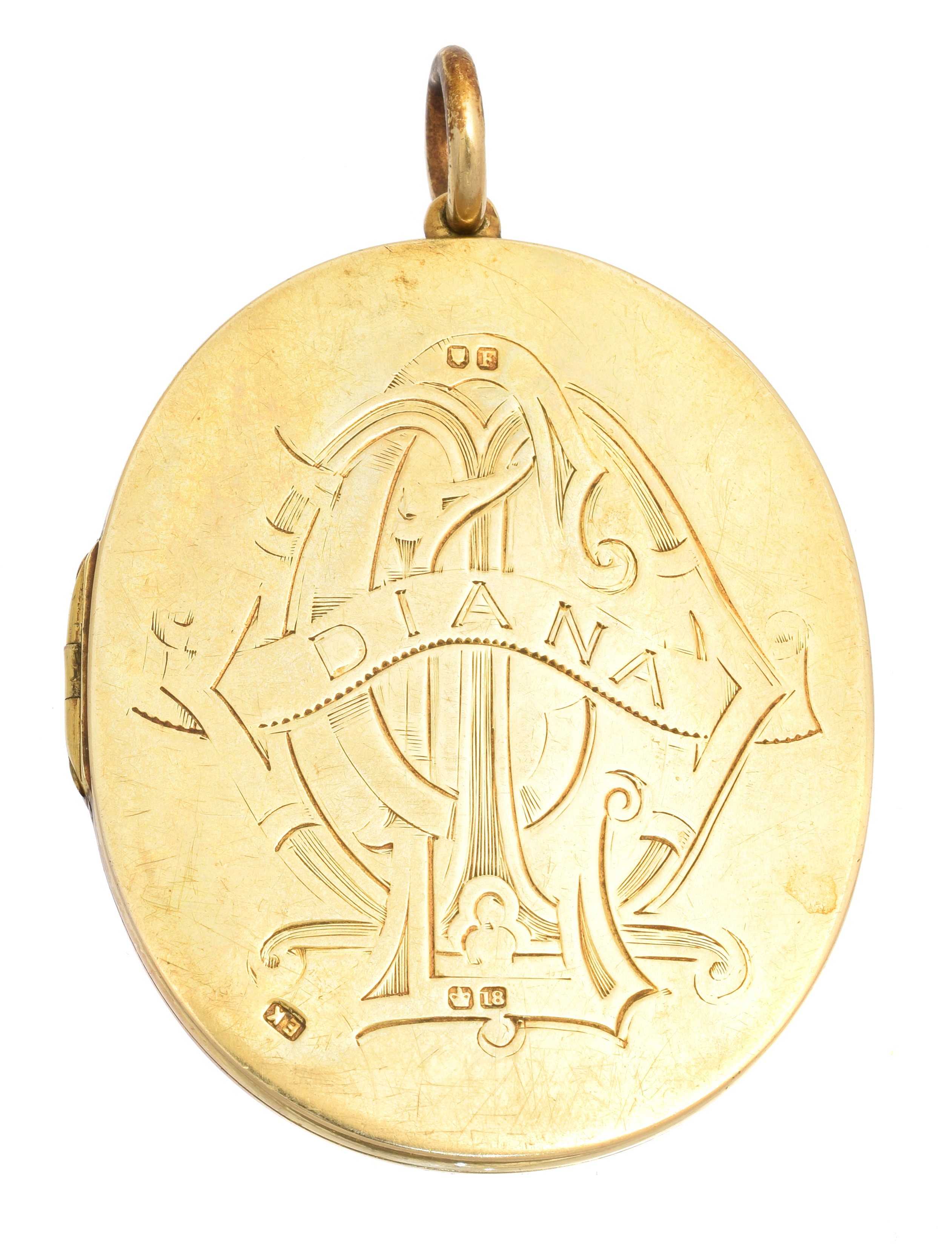 A late Victorian 18ct gold photograph miniature locket, the oval shape hinged locket with engraved with monogram, cartouche and 'Diana' to front, and coat of arms to reverse, the locket opening to reveal a photograph miniature of Diana Caroline Walpole, with inscription reading 'Diana Caroline 2nd daughter and co-heiress of Reginald Robert Walpole, great grandson of Horatio 1st Lord Walpole of Walterton and great great grandson (maternally) of Sir Edward Seymour 8th Duke of Somerset. married XVIII April MDCCCLXXVI to James Boughey Monk Linguard Monk M.A, Trinity College, Cambridge, only child of Richard Boughey Monk Linguard-Monk of Fulshaw Hall, Wilmslow, Cheshire.' hallmarks for EK, London, 1881, length 6.7cm, gross weight 59.7g.