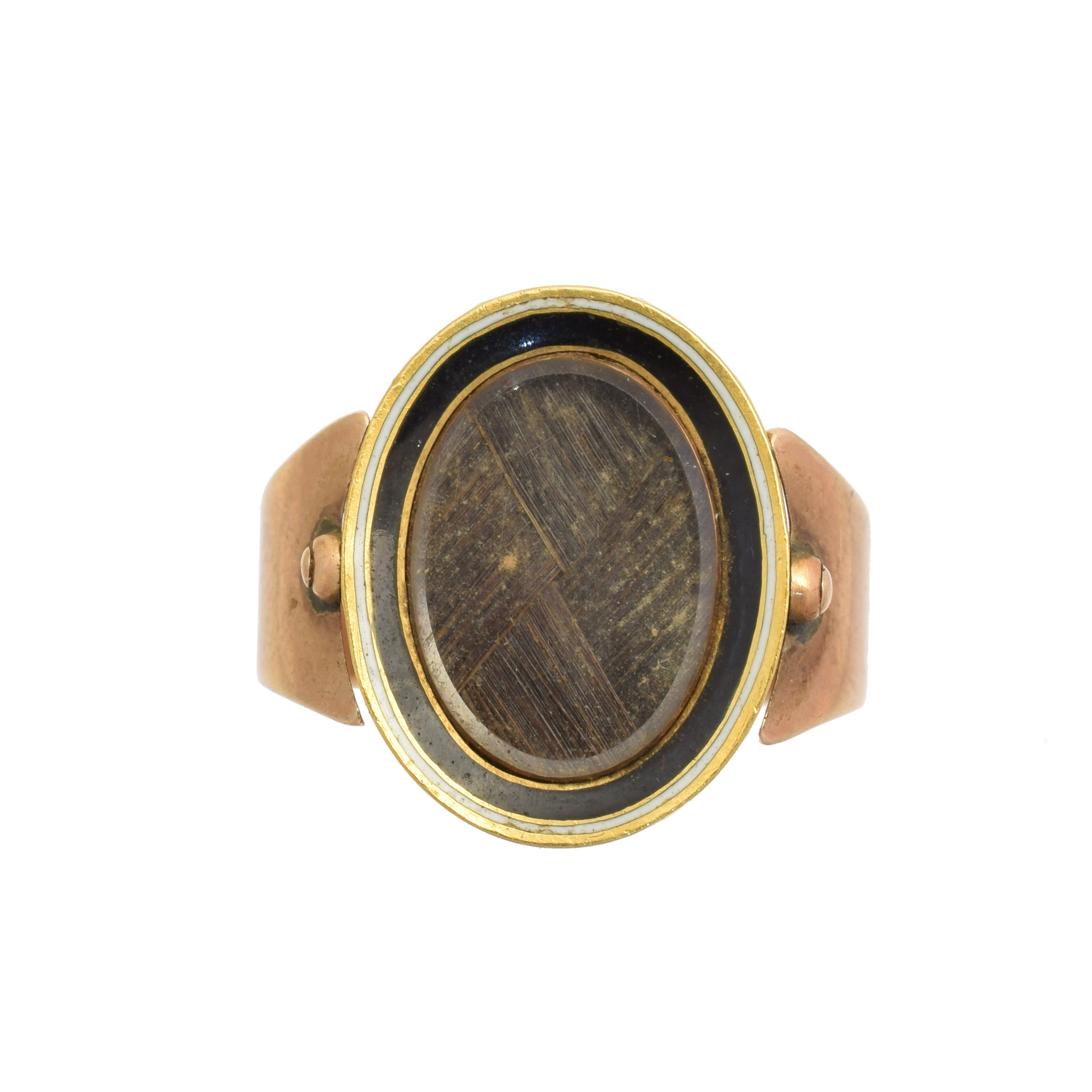 A George III swivel mourning ring, with black and enamel panel inscribed 'Honble Diana Walpole Ob:26 July 1784 Ae: 20' with hair panel to reverse, ring size H, gross weight 5.1g.     The Hon. Mrs. Diana Walpole, neé Grosset, married the Hon. Robert Walpole on 8th May 1780. Robert Walpole (1736 - 1810) was the fourth son of Horatio Walpole, 1st Baron Walpole of Wolterton, and nephew of Robert Walpole, 1st Earl of Orford, who is considered the de facto first Prime Minister of Great Britain.