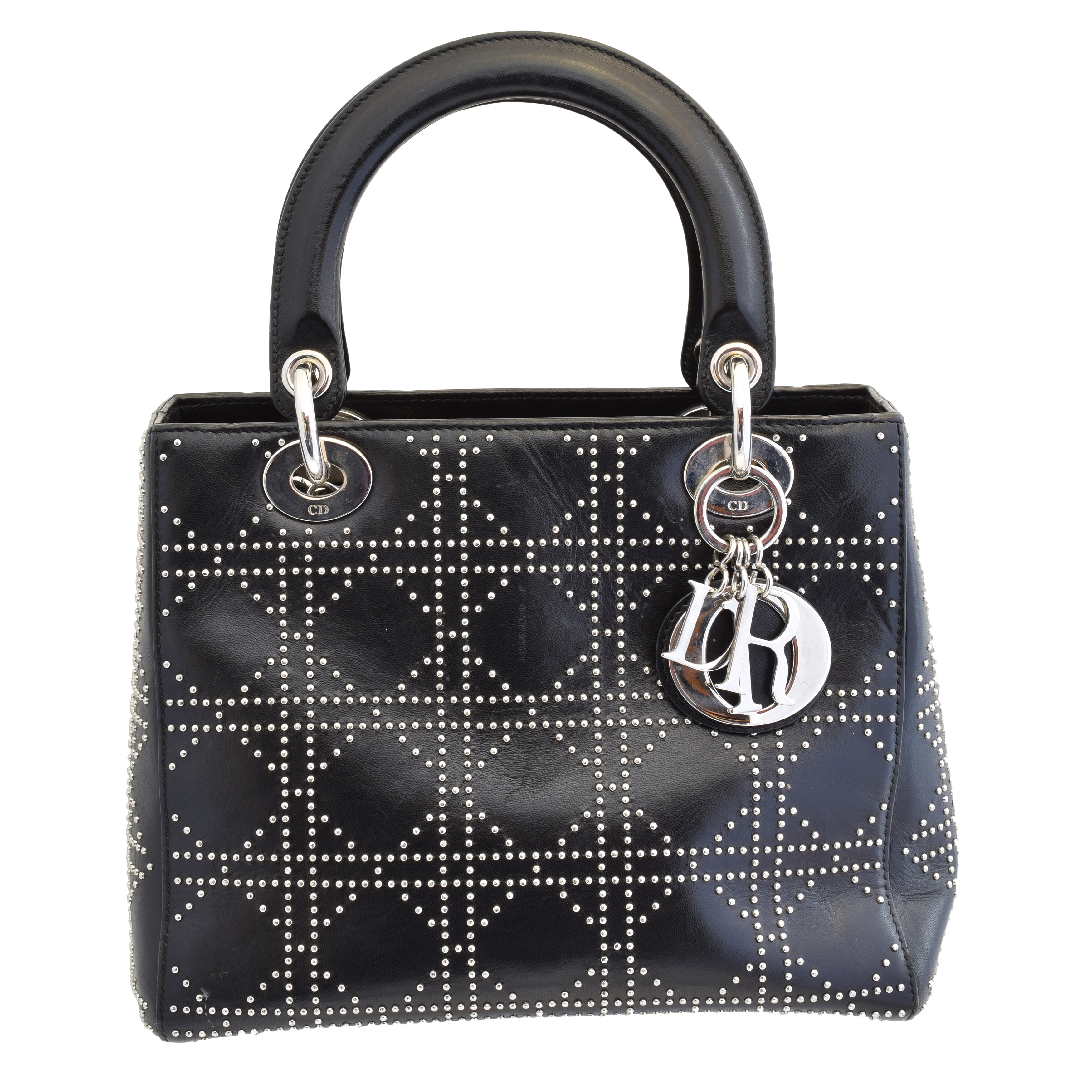 A Christian Dior Lady Dior MM bag, circa 2003, the black leather exterior with silver tone stud embellishment with double top handles and an optional shoulder strap, maker's logo charm, top zip fastening and one interior side pocket, serial no. 09-MA-0053 With maker's care guide, dust bag and authenticity card.