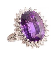 Lot 91 - Amethyst and diamond cluster 18ct white gold ring