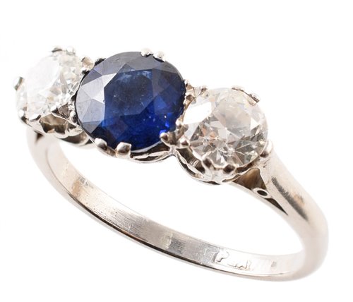 Lot 92 - Sapphire and diamond three-stone ring