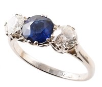 Lot 92 - Sapphire and diamond three-stone ring