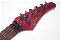 Lot 177 - Marlin super-strat type electric guitar in metalic red with hard case.