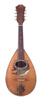Lot 180 - Bowl back mandolin by Mario Casella, with rosewood back and pearl bird sound hole decoration.