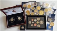Lot 8 - Large collection of cased commemorative coins to include 2012 set to £5, Gibraltar 2016 £100, Britannia 2011 £2, 2015 £5, and £5 white bank note coin.