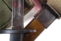 Lot 222 - US M1 Garand SWI bayonet and scabbard dated 1943 with belt, US ammo pouch and a holster.