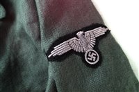 Lot 244 - German green tunic with Third Reich eagle (possibly added later) the inside marked 0/0321/0097II also a post war Luftwaffe jacket together with a pair of leather gaiters