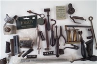 Lot 282 - Collection shooting related items including clips, magazines, reloading tools, parts of guns, etc.