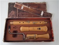 Lot 33 - Hohner Ensemble bass recorder with box.