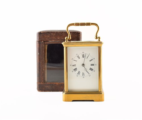 Lot 338 - A 19th century brass carriage clock with original leather carry case.