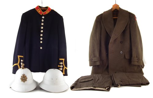 Lot 237 - Royal Marines Bandsman's tunic, two pith helmets Army overcoat and two pairs of trousers.