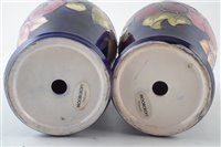 Lot 82 - Pair of Moorcroft vase lamp bases decorated with Clematis pattern