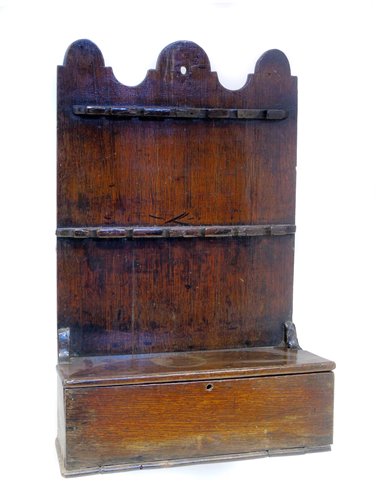 Lot 383 - Early 19th century oak spoon rack.