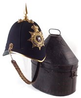 Lot 15 - Northampton Regiment helmet with tin case.