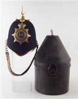 Lot 15 - Northampton Regiment helmet with tin case.
