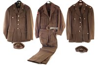 Lot 228 - Three British Army R.E.M.E. 1950's uniforms with two caps.