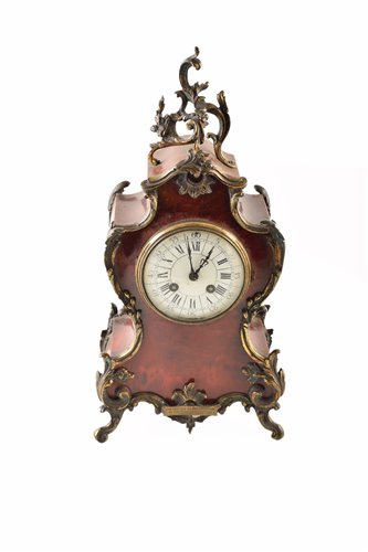 Lot 341 - A 19th century Louis XIV style mantel clock.