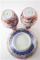 Lot 105 - Japanese Imari bowl and a pair vases.