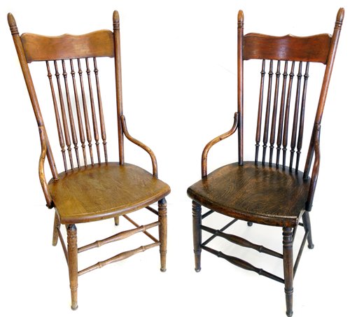 353 - Two oak and elm Arts & Crafts design single chairs.