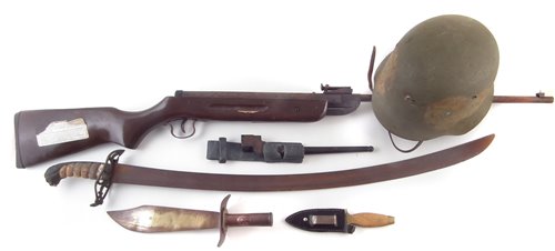 Lot 289 - A collection of items, German type helmet, 22 air rifle, No. 4 bayonet trench art knife, sabre