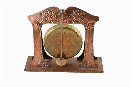 Lot 6 - An Arts & Crafts movement copper and brass dinner gong