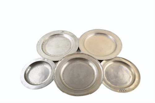 Lot 13 - Five pewter chargers of varying sizes and touchmarks. These include Harris, London touchmark amongst others.