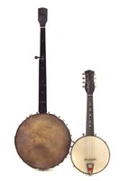 Lot 138 - Fretless five string banjo and a banjoline in case