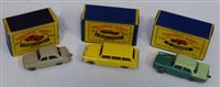 Lot 79 - Matchbox Series 31 American Ford station wagon, Series 30 Ford Prefect and Series 29 Austin Cambridge (new model) all complete with boxes.
