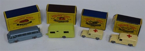 Lot 90 - Matchbox Series 14 ambulance, Series 14 Daimler ambulance, Series 40 long distance coach, Series 23 Berkley Cavalier caravan.