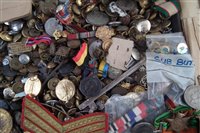 Lot 227 - Large collection of military buttons, badges, and other uniform items, together with a selection of WW2 medals.