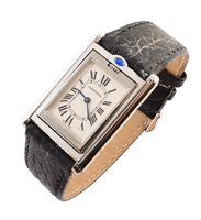 Lot 166 - A stainless steel Cartier 'Tank Basculante'  manual wind wristwatch
