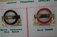 Lot 26 - Six London Transport bus and underground enamel cap badges