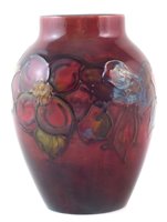 Lot 74 - Moorcroft flambe vase, decorated with clematis pattern