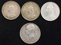 Lot 25 - Three Queen Victoria Shillings and a Victoria Diamond Jubilee silver medal (4).