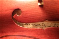 Lot 18 - 19th century violin after Pietro Guarneri together with three bows and a case.