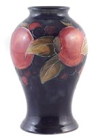 Lot 80 - Moorcroft pomegranate vase.