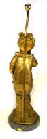 Lot 322 - A 19th century bronze figural lamp on a marble base.