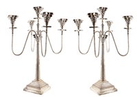 Lot 108 - A pair of silver plated candelabras