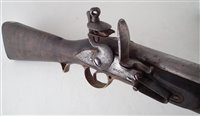 Lot 1 - East India Company flintlock musket dated 1800 and a powder flask