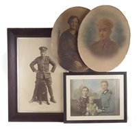 Lot 338 - Framed German WWII family group picture, two oval WWI photographs and one other.