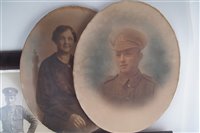 Lot 338 - Framed German WWII family group picture, two oval WWI photographs and one other.