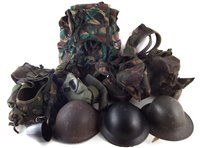 Lot 240 - Quantity of modern military rocksacks, three helmets, respirator and hat.
