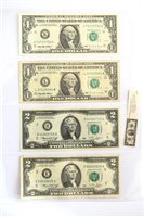 Lot 23 - Three assorted albums of foreign banknotes.