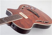 Lot 105 - Crafter SAT Bubinga hybrid guitar with hard case and accessories.