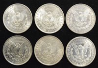 Lot 2 - Six assorted USA silver Morgan Dollars (6).