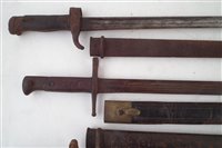 Lot 202 - Four bayonets with scabbards